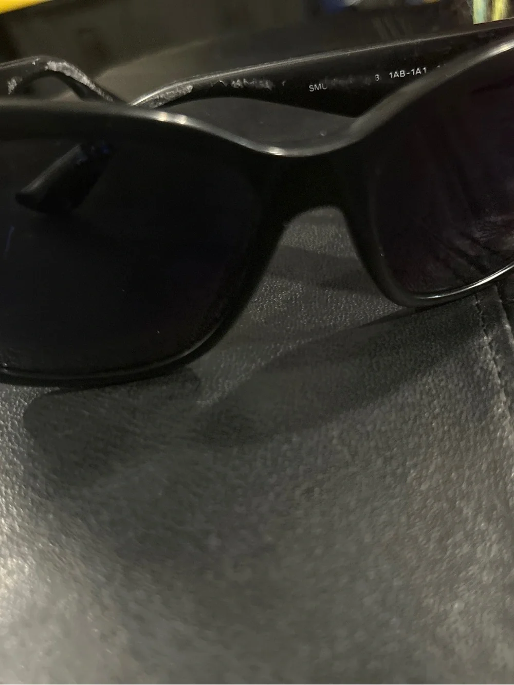 Miu Miu Black Cat-Eye Sunglasses with Dark Lenses